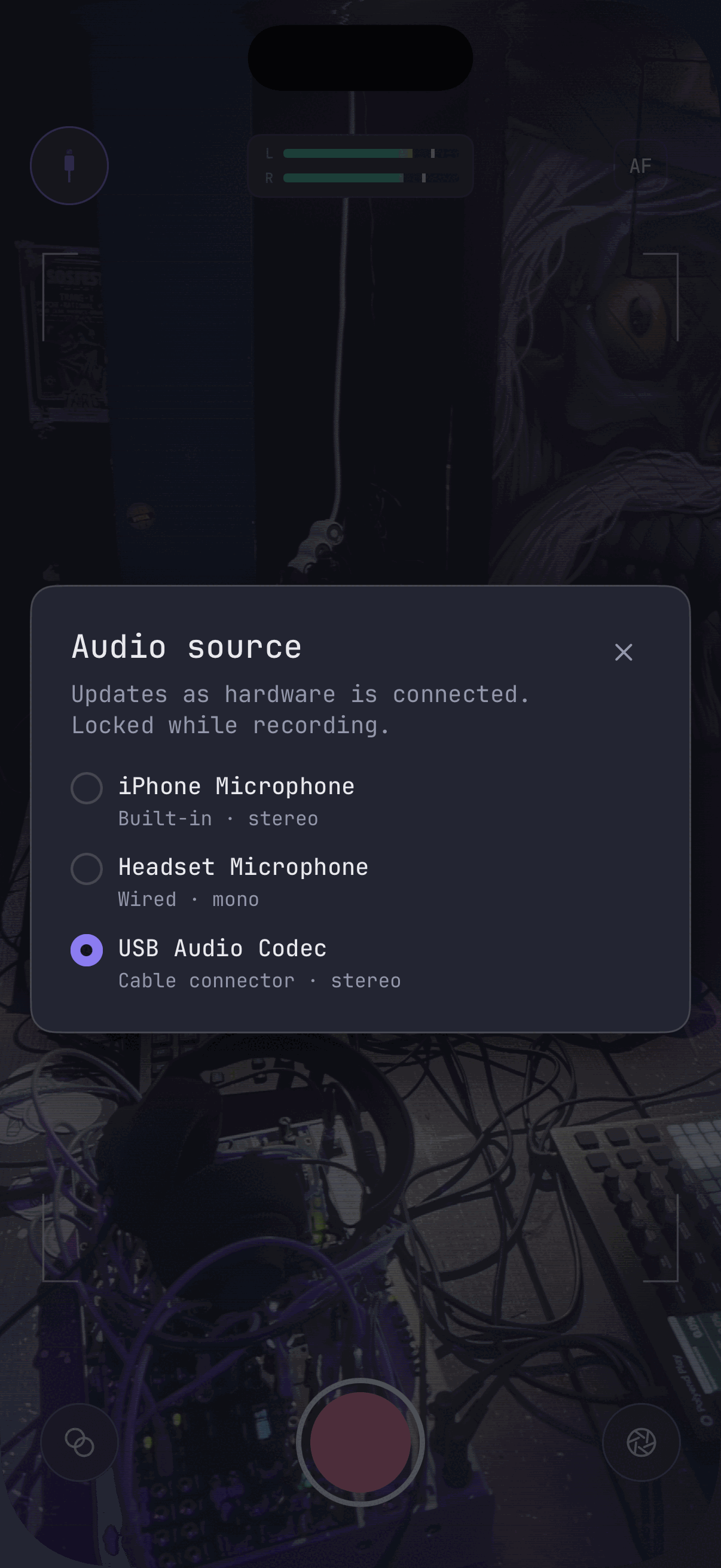 DVC Cam's audio source picker, with a USB interface chosen over the built-in and headset microphones